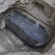 The granite coffin after it was discovered.